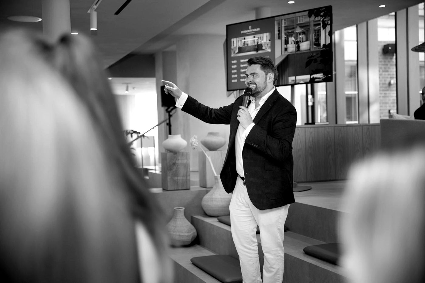 Rhys Morris hosting a corporate event