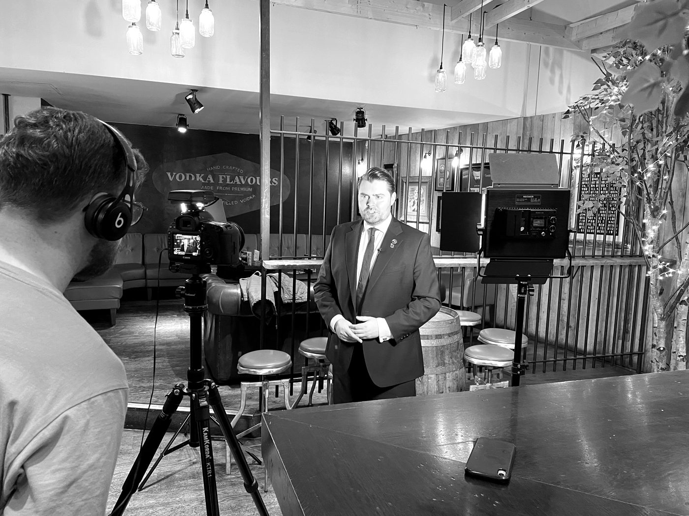 Rhys Morris interviewing a guest at a live event