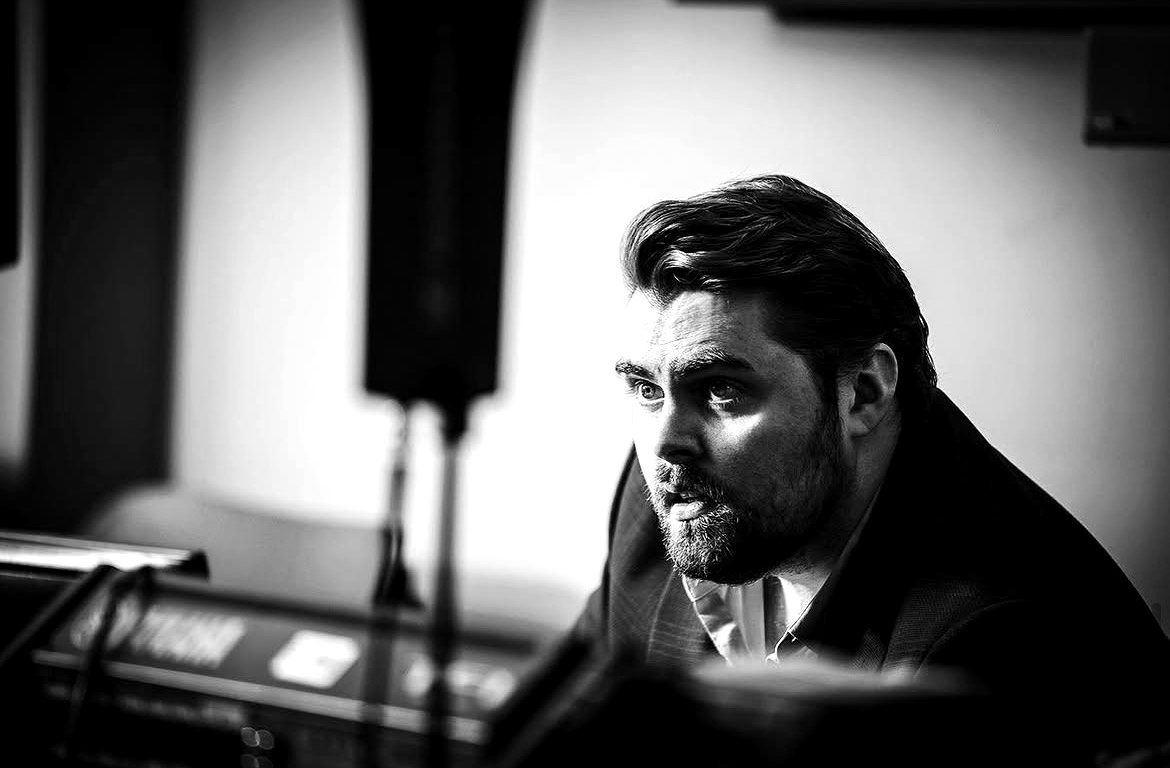 Rhys Morris on the microphone, live event host