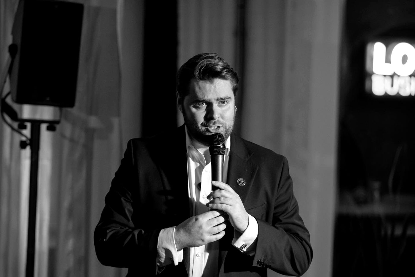 Rhys Morris hosting live with a microphone